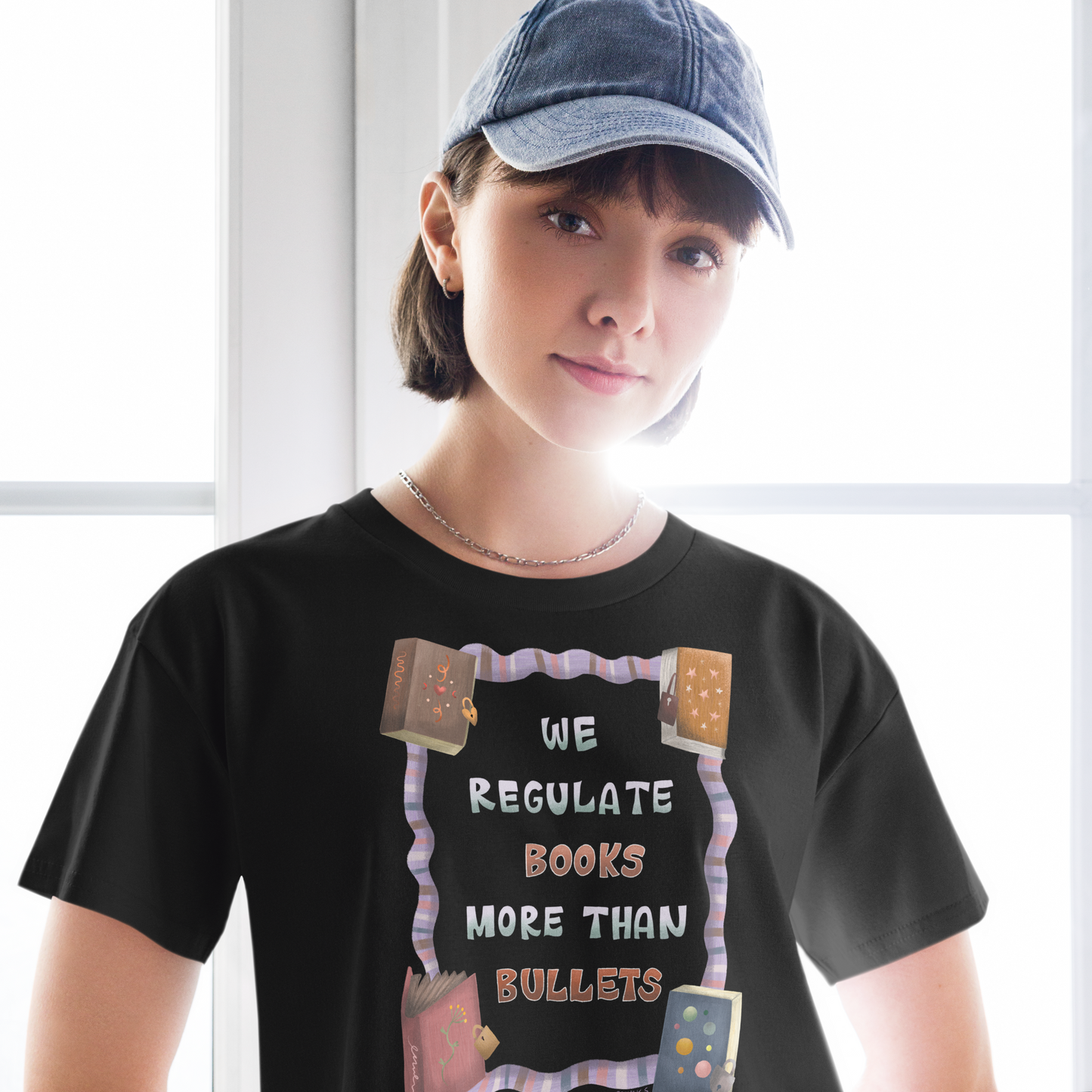 We Regulate Books More Than Bullets Woman's Crop Top